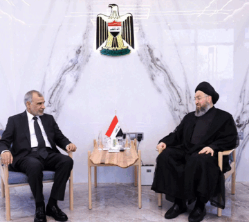 الحكيم مع وزير المالية 